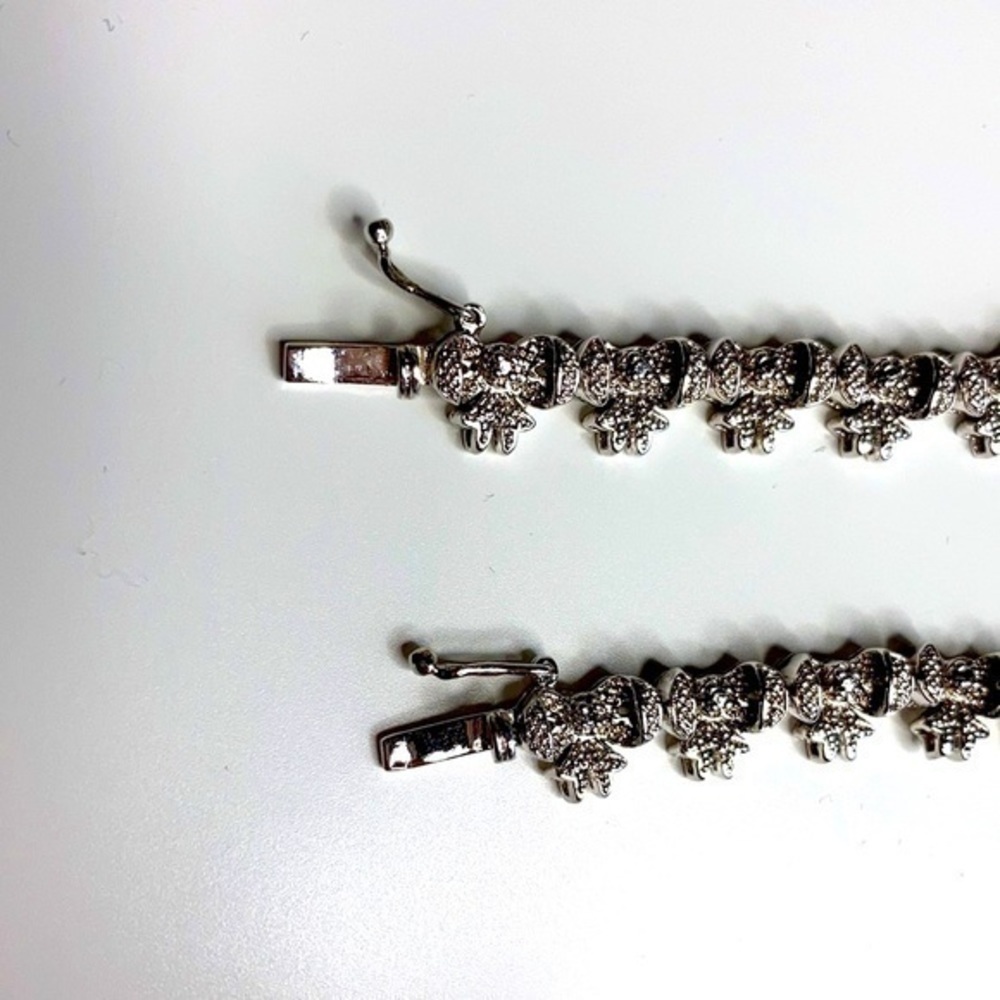 Sterling Silver String Of Bows Set Of 2 - image 3